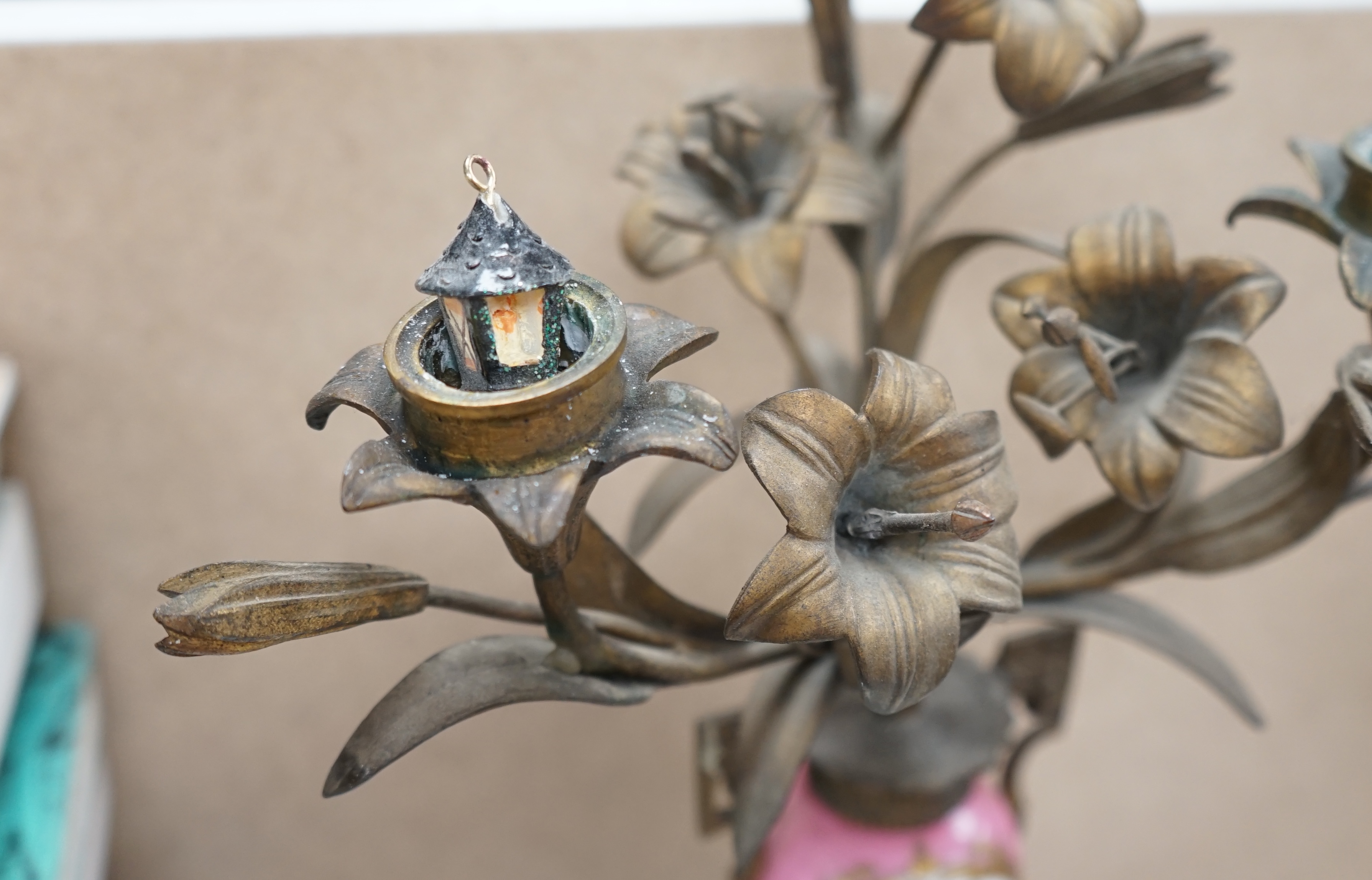 A pair of French porcelain mounted gilt metal candelabra and one other pair, tallest 45cm. Condition - fair